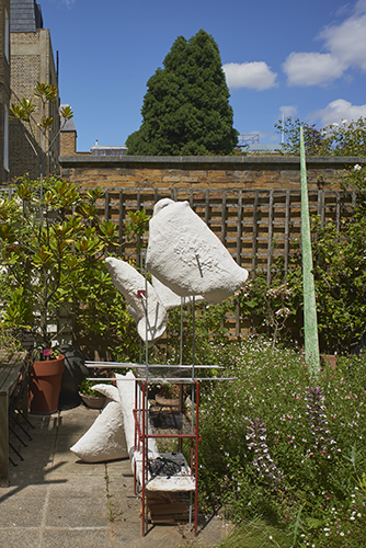 Finn Thomson 'Skewered Forms' 2019, 222×120×60cm, steel, stainless steel, crystacal plaster, fibre, glass, aluminium, wood, oxide paint (left), International Lawns  'Lawn Fragment (from 'Back to the Future') (detail)' print on canvas, stretched onto timber frame, 2018 (right), photo by Andy Keate