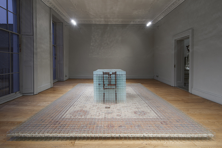 image: David Cheeseman 'Once ever After: Thrice Removed' 383×290×81(h)cm, 2014, glass, tape, carpet and furniture (7,752 glass boxes, each 58mm cubed) installation photography by Andy Keate