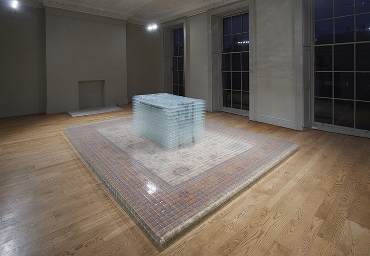 image: David Cheeseman 'Once ever After: Thrice Removed' 383×290×81(h)cm, 2014, glass, tape, carpet and furniture (7,752 glass boxes, each 58mm cubed) installation photography by Andy Keate