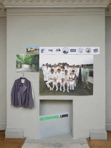 A Circle, image: International Lawns w. Vivien Lee 'A Fustian Proposal (slate grey corduroy), A Fustian Proposal (natural calico)' both Sm 2014, International Lawns w. Alex Mckellar 'RCA logotype test in colour 1 (team)' Epson Ultrachrome on 600gsm Somerset 104 × 139 cm 2014, 'RCA logotype test in colour 2 (entrance)' as previous 45 × 60 cm 2014, 'RCA logotype test in colour 3 (process)' as previous 23 × 34 cm 2014, International Lawns 'RCA logo proposal 2,3,6,14,19,23,24,31 photocopy, gouache, paper 19.5 × 19.5 cm 2014, International Lawns 'Sign' screen print on cutting mat 58.5 × 92 cm 2014; installation photography by Andy Keate