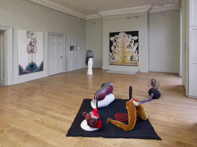 Emma Talbot 'Step Inside Love' installation view, showing 'Intangible Things (Dream)' 80(h)×220×200cm, mixed media, 2015 in the foreground and 'Intangible Things (Ghost)' 140(h)×45×45cm, mixed media, 2015 towards the rear, photograph by Andy Keate