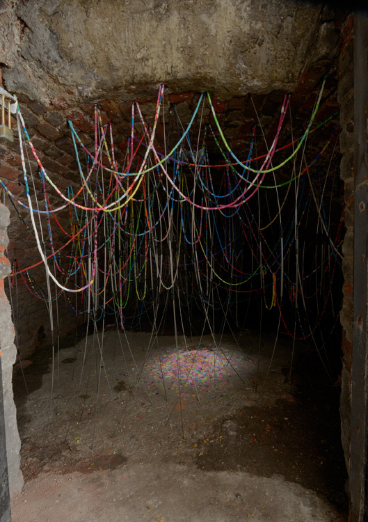 Mhairi Vari 'perpetual doubt, constant becoming (John Street)' loom bands, steel rods, installation view, coal cellar, 3 John Street, 2015, photograph by Andy Keate